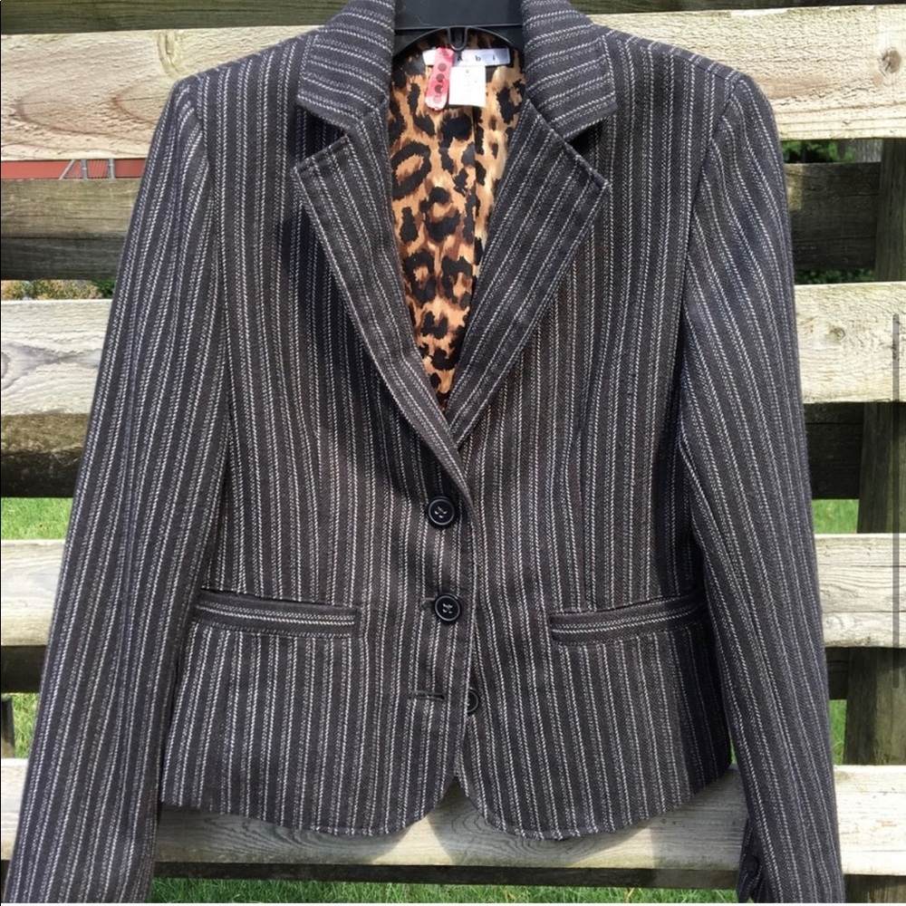 On trend CAbi striped suit jacket with fun details